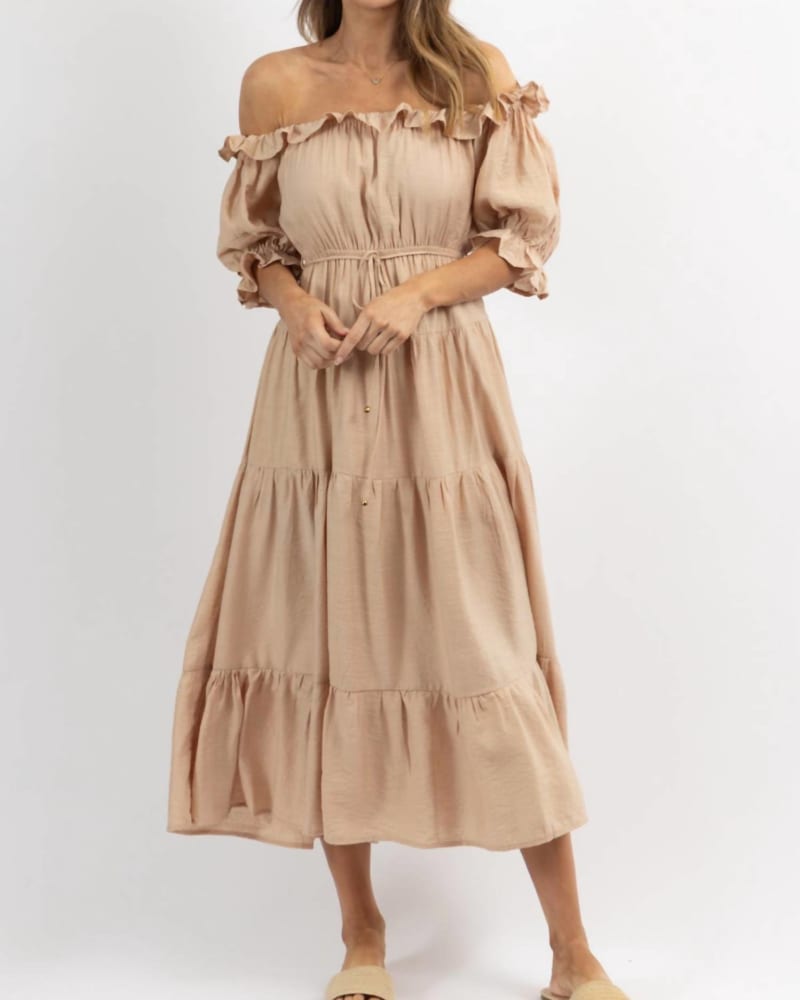 Front of a model wearing a size L Off Shoulder Ruffle And Tie Waist Dress In Nude in Nude by One and Only Collective. | dia_product_style_image_id:358024